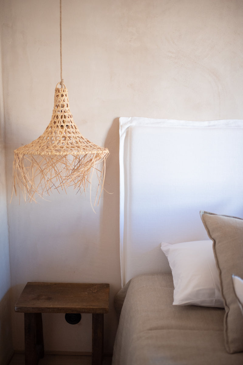 Cabecero de cama con detalle de pestaña en lino lavado blanco hecho a mano en España por TC collection