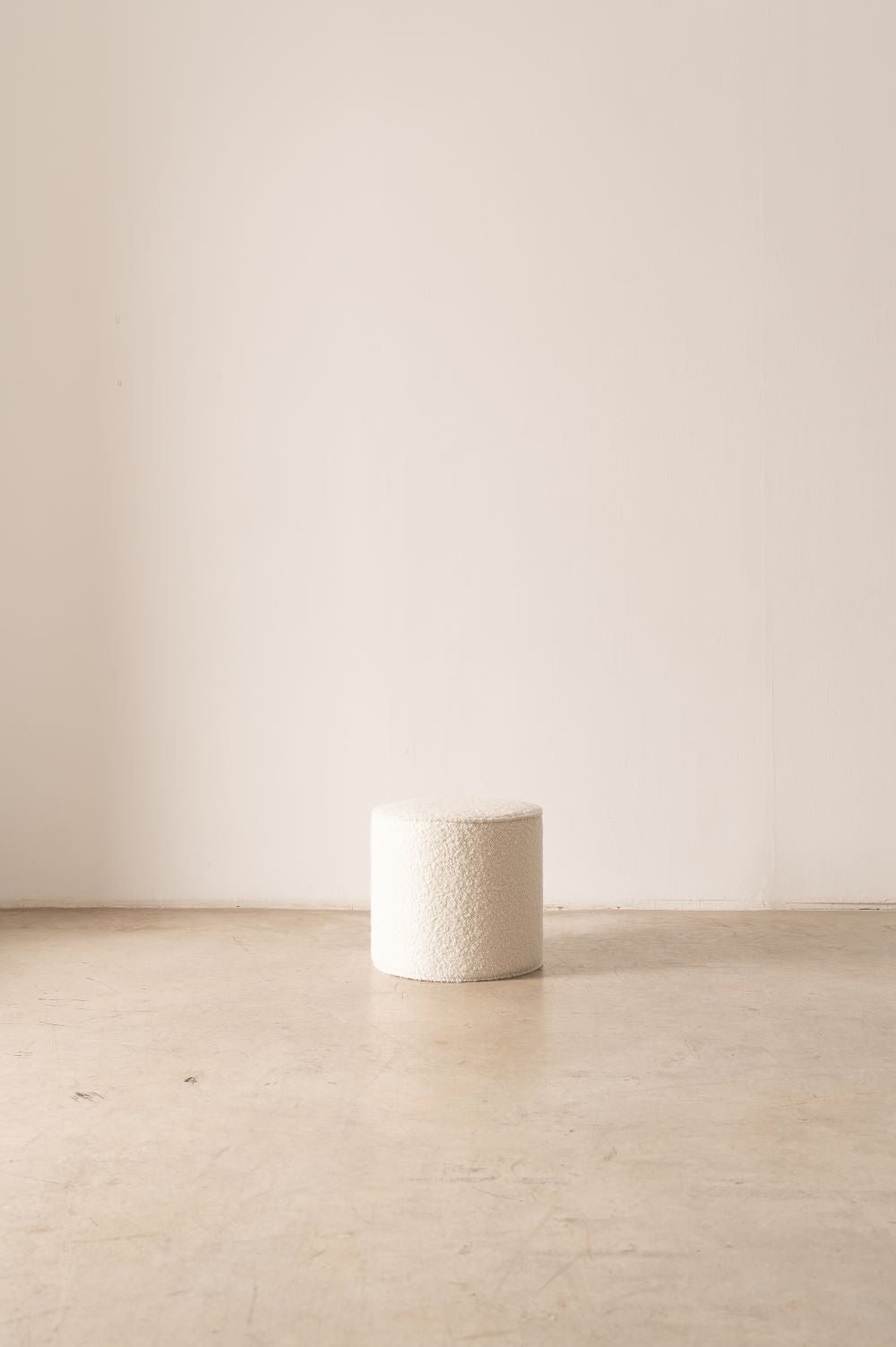 Detalle textura rizo bouclé blanco pouf artesano algodón
